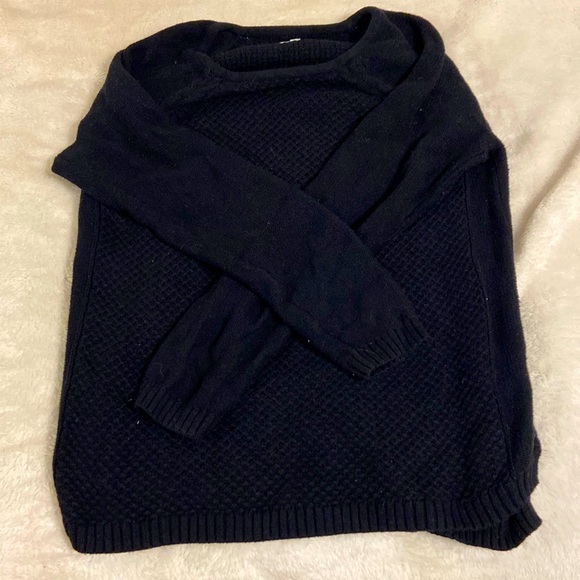 A black crewneck sweater
